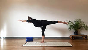 Warrior 3 yoga pose with Clara Lemon to improve quality of life